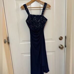 Elegant Navy Blue Lace Dress with silver accents